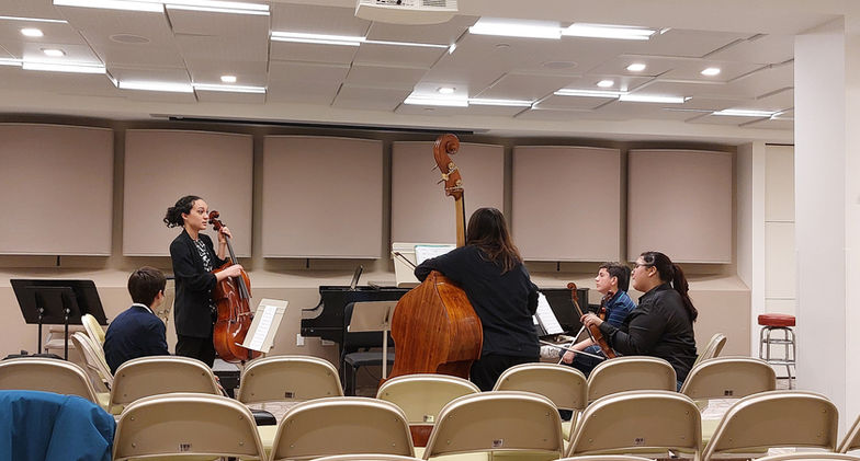 Francesca and students from Project STEP in the basement of the BSO rehearsing
