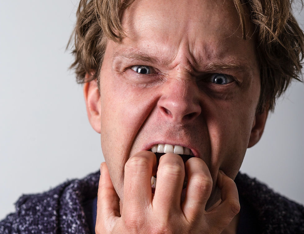 Singer is frustrated with himself for singing off-pitch.