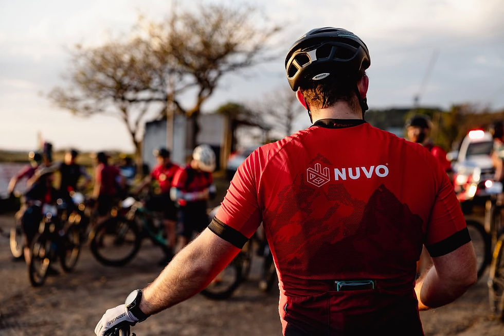 Cyclist wearing NUVO branded kit