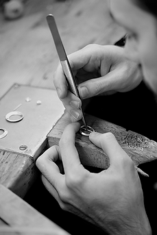 Jeweller making ring
