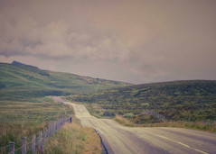 Rain pours over the road from Northern Skye toward Portree.
