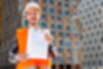 medium-shot-portrait-construction-engineer-holding-contract.jpg