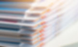 Stack of report paper documents for business desk, Business papers for Annual Reports file