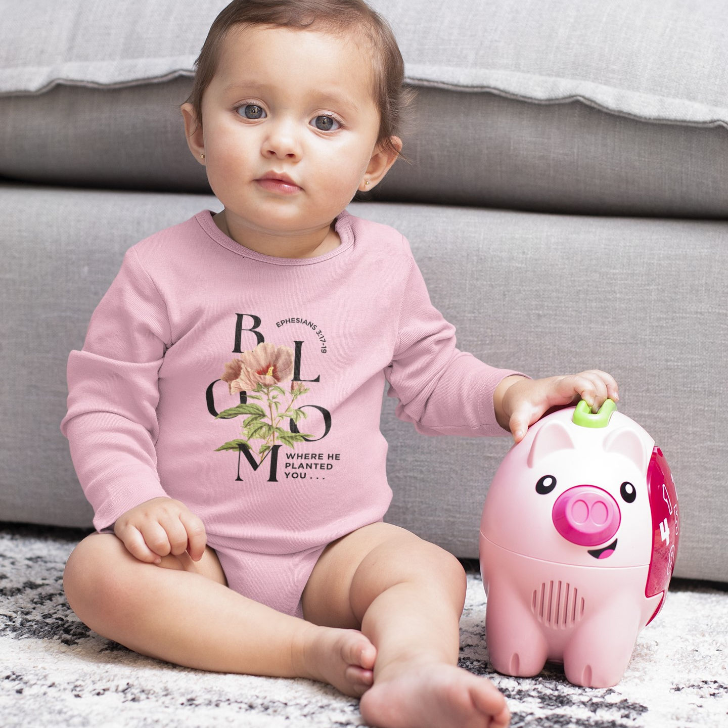 Bloom Infant Long Sleeve Bodysuit display with baby model