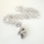 Sterling silver anatomical heart necklace gift for her, silver and gold jewellery is handmade by a small ethical and sustainable jewellery business in Wollaton Nottingham UK