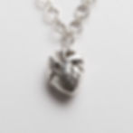Sterling silver anatomical heart necklace gift for her, silver and gold jewellery is handmade by a small ethical and sustainable jewellery business in Wollaton Nottingham UK