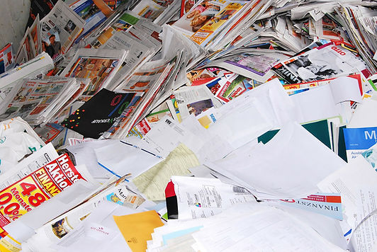 A pile of papers on the desk