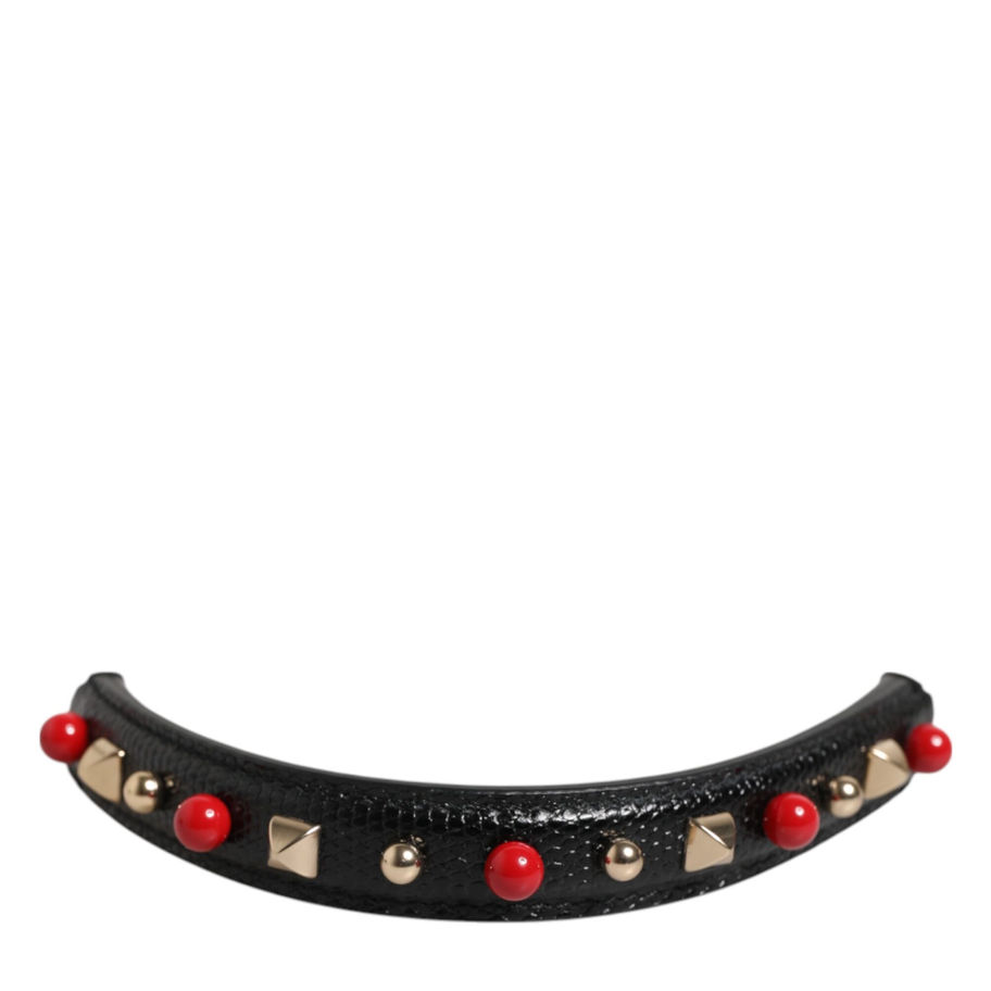 Black embellished leather bag handle with red and gold studs