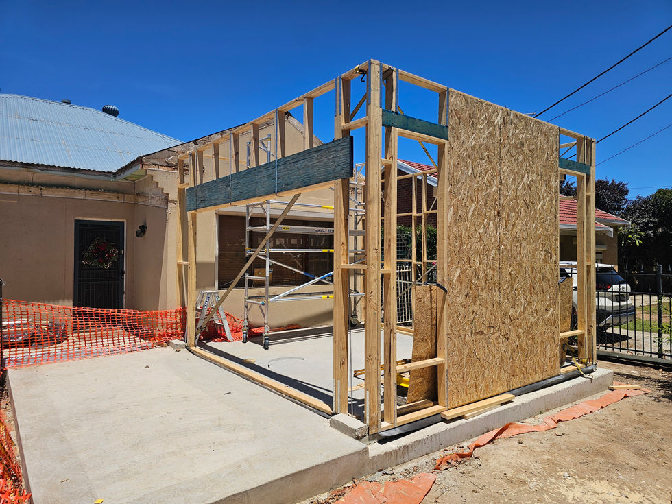 Wooden framework of a building under construction.