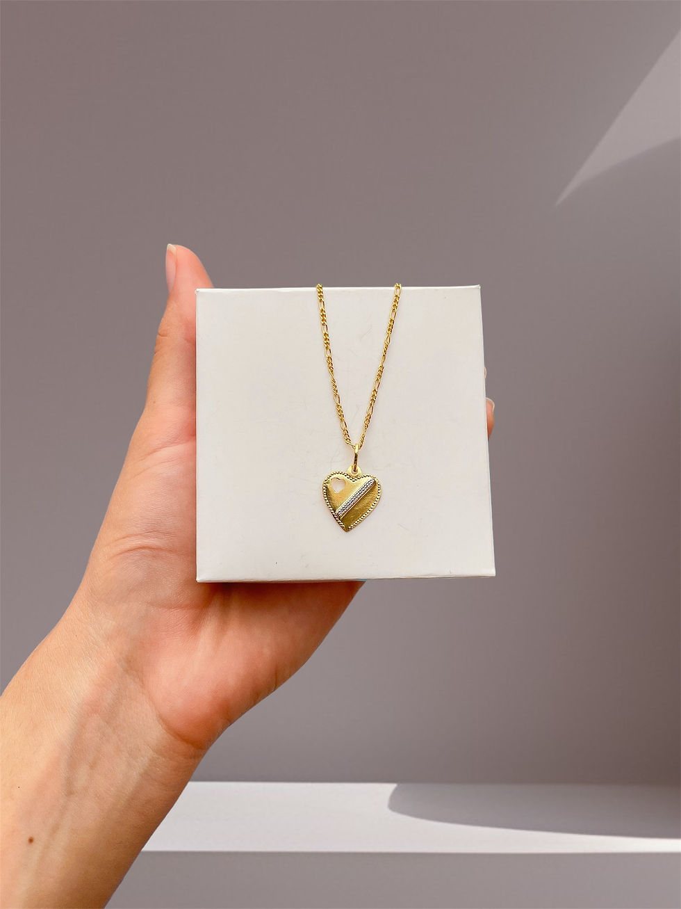 Pingente coração prata e dourado