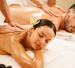 young-couple-relaxing-during-back-massage-health-spa-focus-is-young-woman.jpg