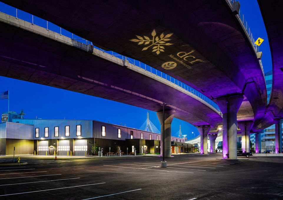 Projection of the DCR logo at North Point Bridge at night time- Crowley Cottrell LLC Landscape Architecture
