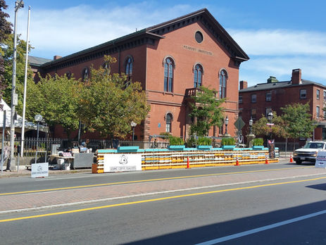 view from across the street of the brightly painted parklet.