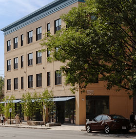 New building continuing street edge with new streetscape