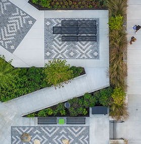 Aerial image of paver "rugs" and park "rooms"