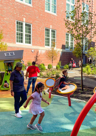 Children playing at Sarah Roberts School playground