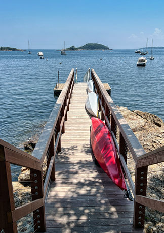 Bridge out to a wooden dock on the ocean