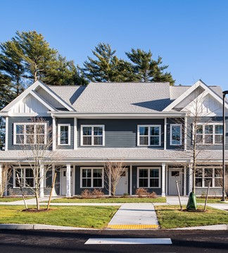 House with tree and lawn planting at Swifts Landing