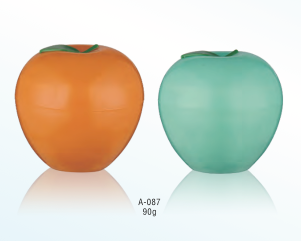 jars formed as organge and apple