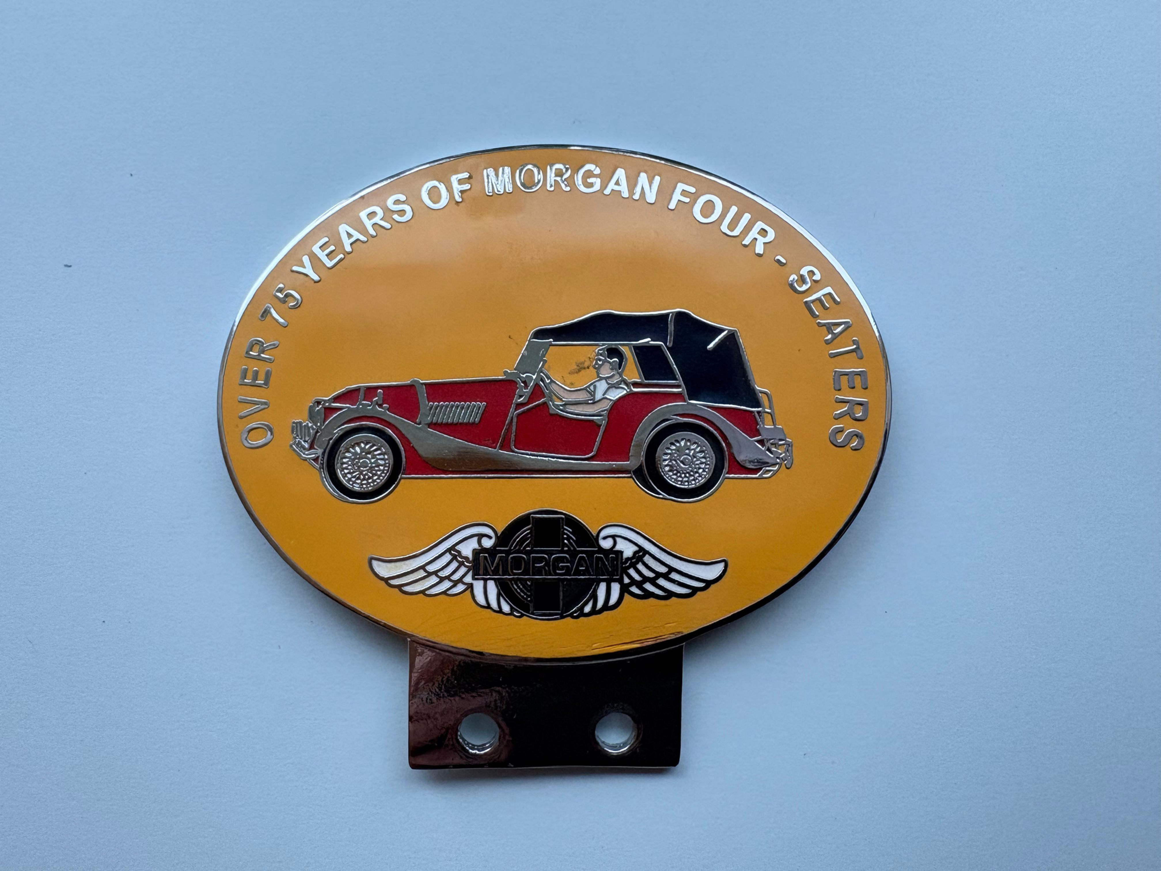 Over 75 Years of Morgan four-seaters, red car