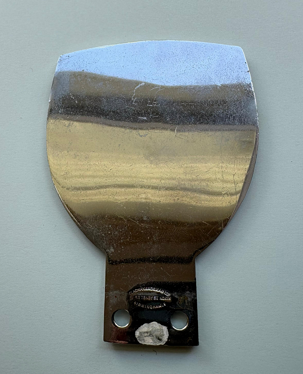 75 Years of Morgans badge by Gladman & Norman