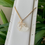 サムネイル： Wire-wrapped Quartz Crystal snake Necklace