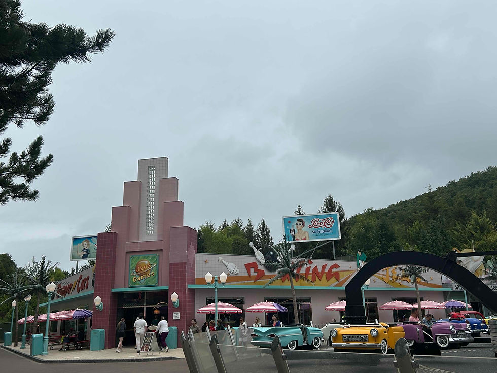 Spatiale Experience is in the Rock'n'Roll Village: a weird juxtaposition of 1950s Americana against a forest backdrop.