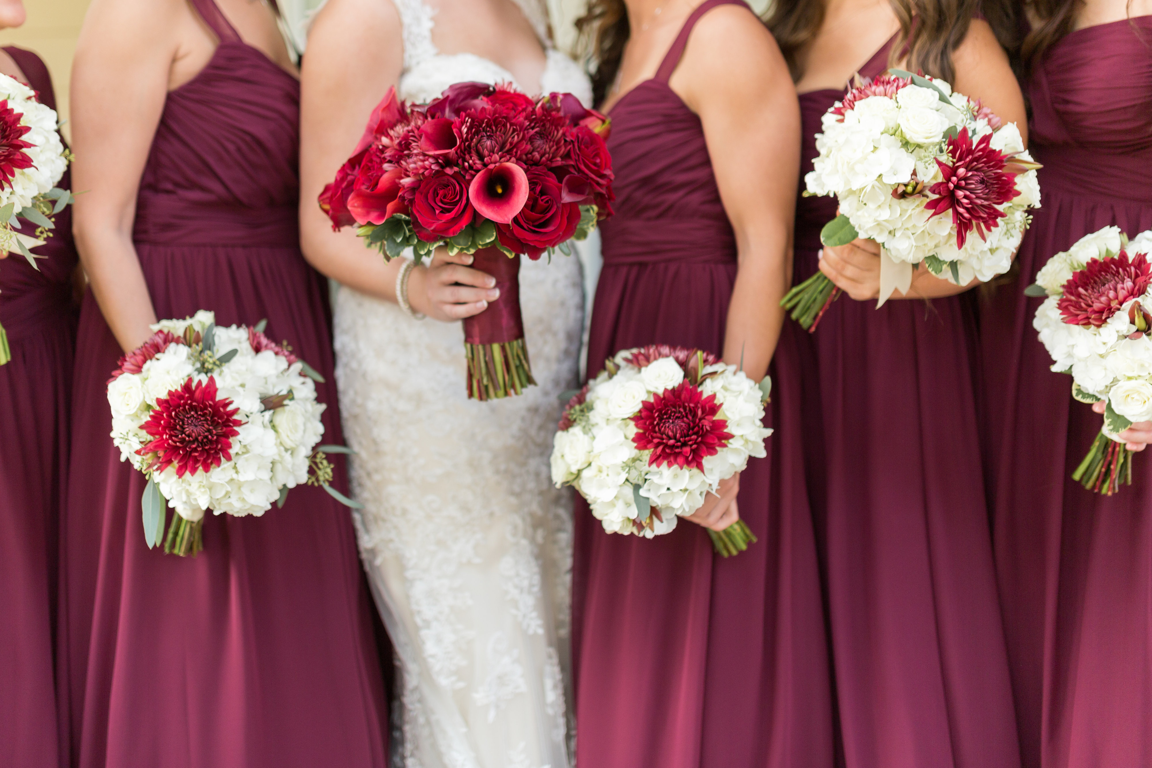 Red Bridesmaid Dresses With White Bouquets
