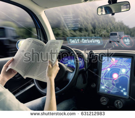 stock-photo-cockpit-of-autonomous-car-a-vehicle-running-self-driving-mode-and-a-woman-driver-being-r