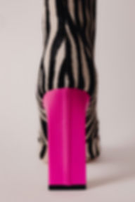 Close-up of Kate Zebra luxury boots and sculptural heel