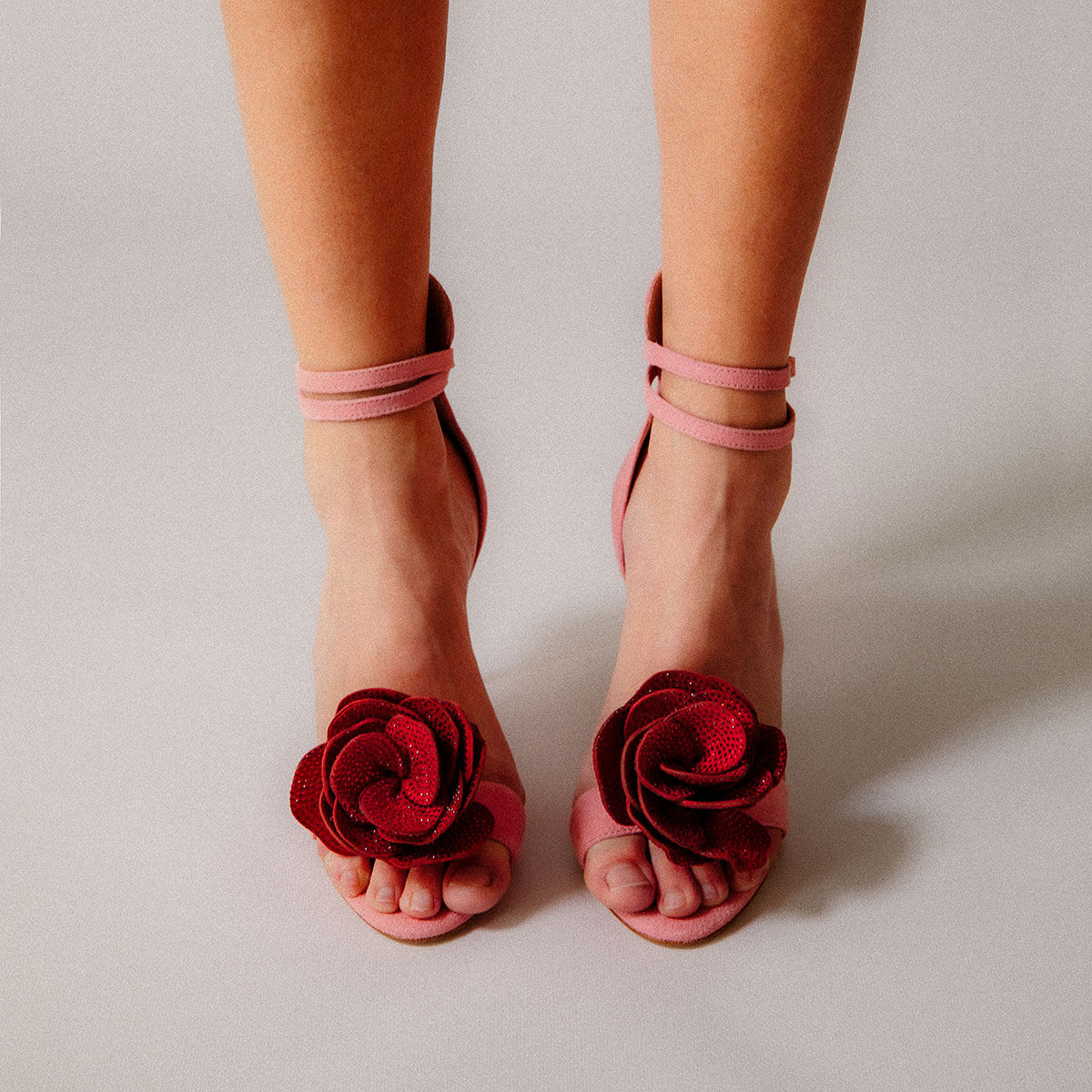 designer shoes all pink with red flowers