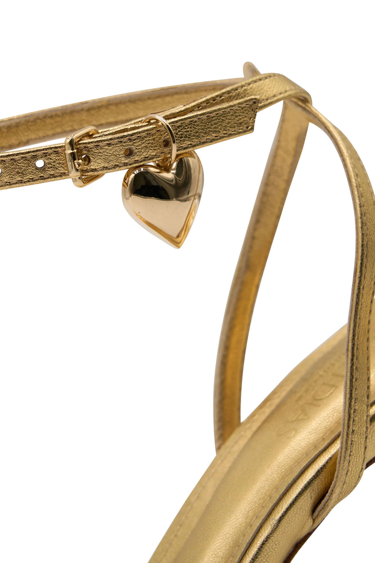 luxury gold heart on a designer sandal for printemps New York