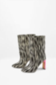 Side view of Kate Zebra designer boots with pink block heel