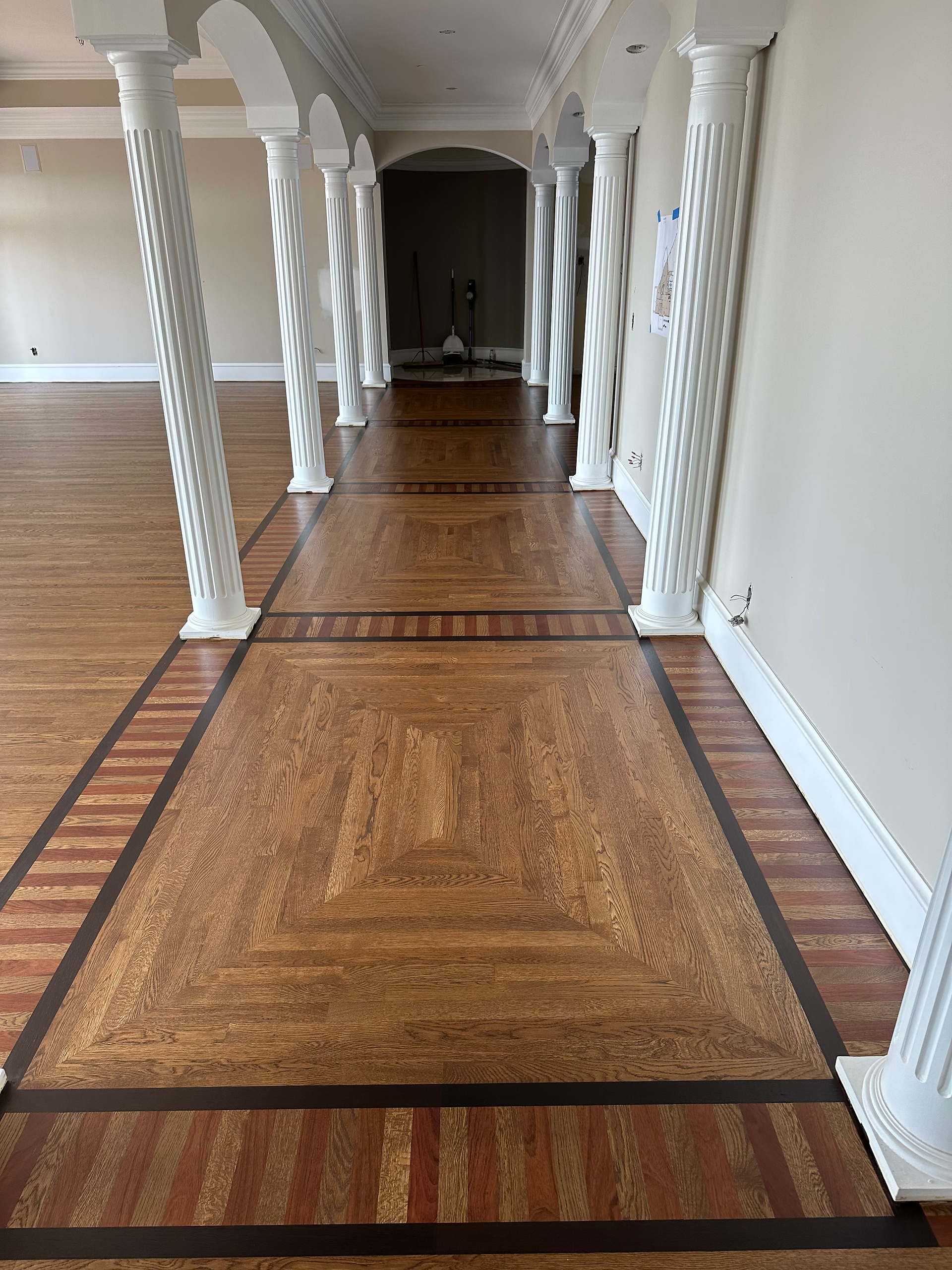 After image of Custom White Oak refinish floors in Cincinnati Ohio with border frame and design details