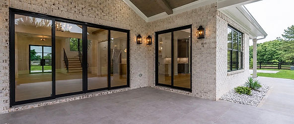 Beautiful Outdoor Living Area with custom design and luxury finishes in Monroe GA