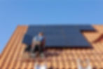 WorkersinstallingsolarelectricpanelsonahouseroofinOchojnoPolandjpg_624dc8bfee789.jpeg