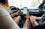 driver-checking-car-sharing-app-2023-11-27-05-03-23-utc_edited.jpg