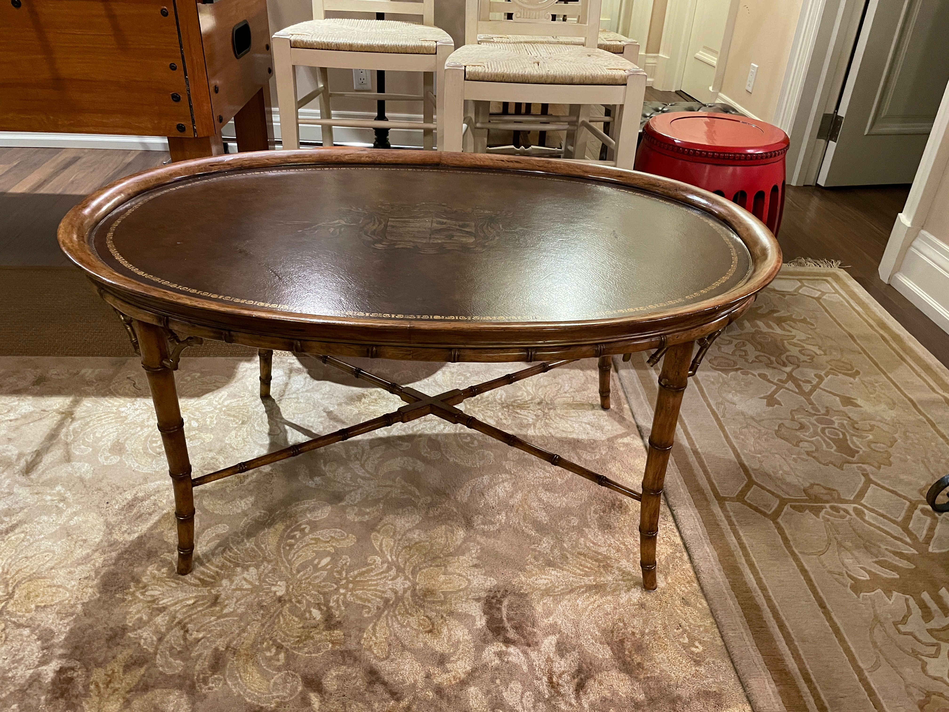 Lot 66 - Oval Leather Top Coffee Table (Retail $1,290)