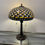 Thumbnail: Lot 80 - Tiffany-Style Stained Glass Lamp & Glass Paperweights