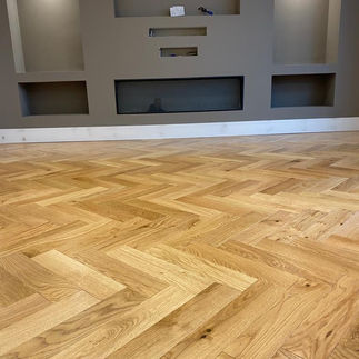 finished media wall and Herringbone floor construction by local kent carpenters IJB carpentry