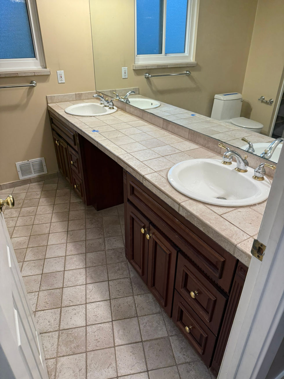Bathroom remodel before picture of vanity.