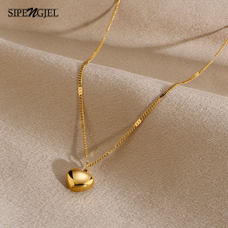 Miniatura: Collar con colgante de corazón de acero inoxidable