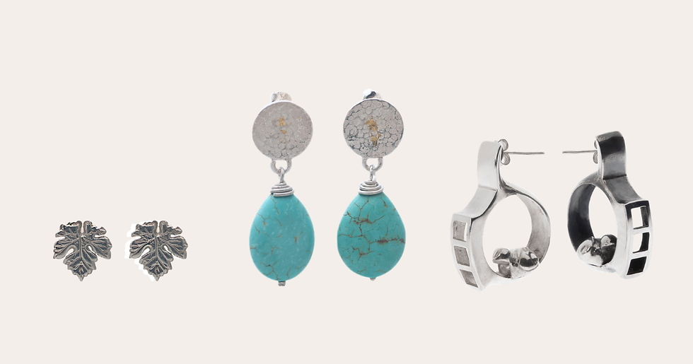 Three different earring styles—stud, drop, and hoop—displayed side by side on a neutral background, illustrating how to choose earrings based on style and proportion