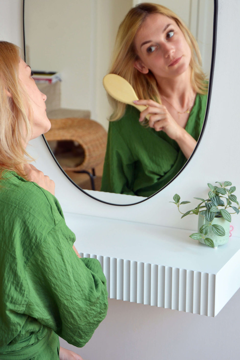 Thumbnail: girl sitting at dressing table