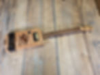 Thumbnail: 3 String Electric Cigar Box Guitar        Feral Flying Pig