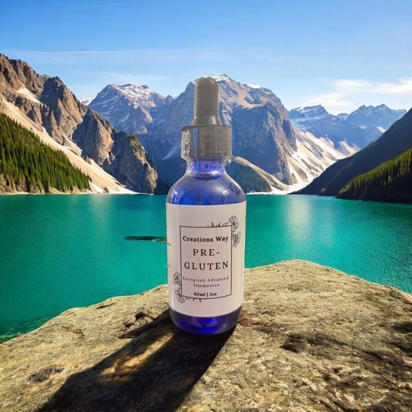 Blue bottle with 'Gluten' label, lake and mountains background