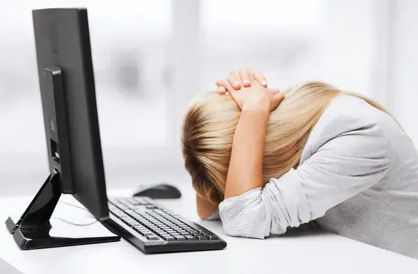 depositphotos_30812771-stock-photo-stressed-woman-with-computer.jpg