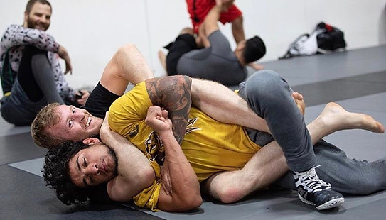 World champion MMA coach and 2nd degree bjj black belt teaches our no gi grappling classes in peoria az.jpeg
