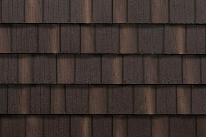 EDCO Infiniti textured steel shake roofing in Aged Bronze Enhanced, showing overlapping shingle rows