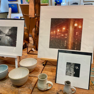 Exquisite prints by Anja Percival with Lara Clahane's popular cream and pale blue ceramics.